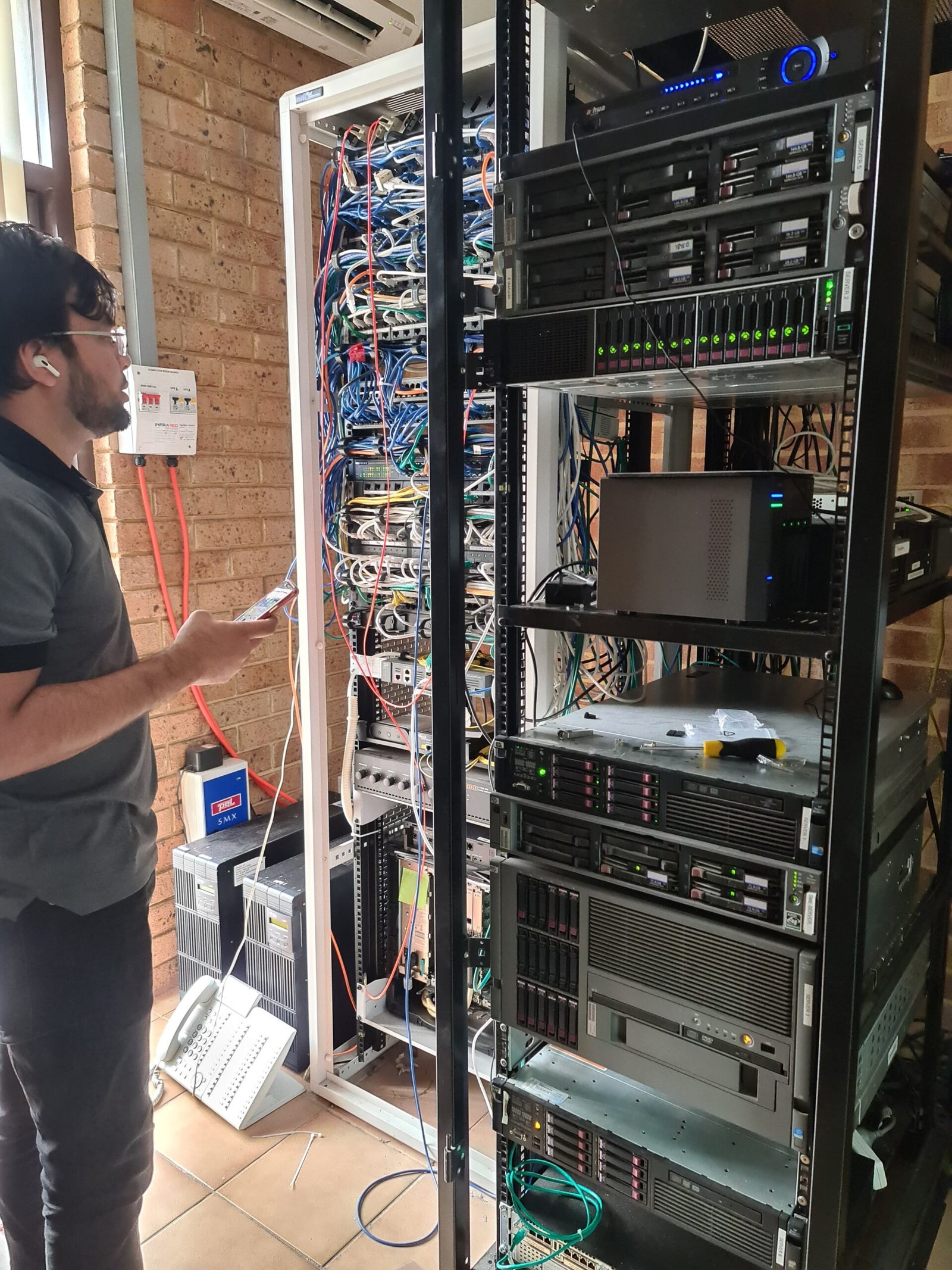 Microsys technician repairing a desktop computer in Perth workshop