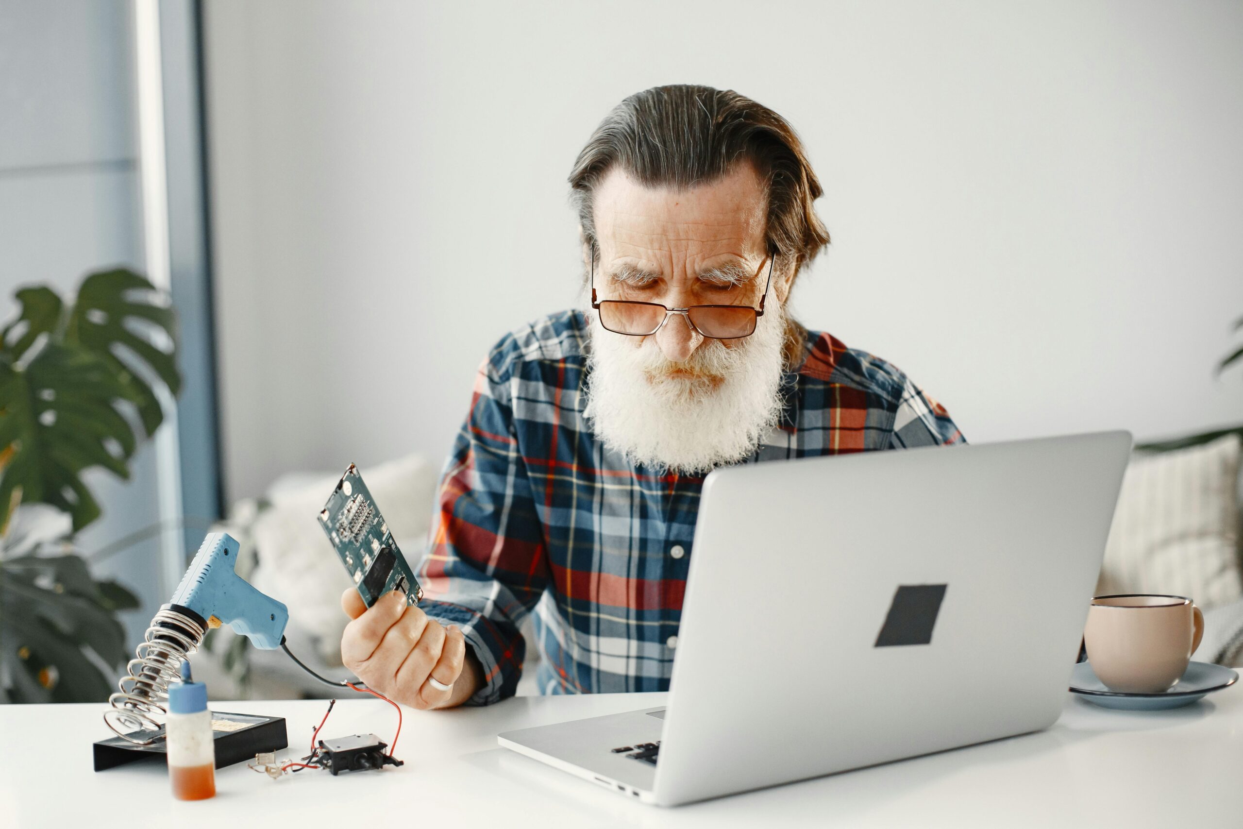 Technician assessing a hard drive for data recovery in Perth